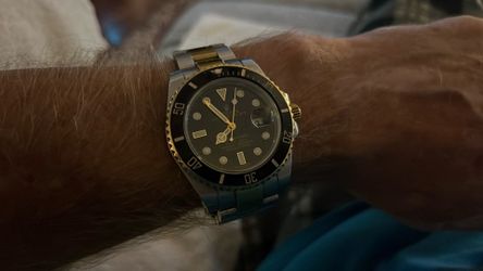 Gold colored watch