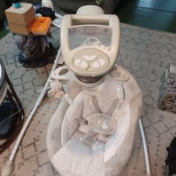 Ingenuity InLighten Soothing Baby Swing.
