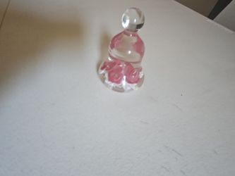 made by Joe St. Clair or Maude & Bob St. ClaClear bell-shaped glass with pink floral/trumpet motifs and a white base or crimped accents inside.