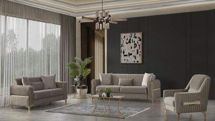 Sleek, vertical detailing sofa with polished gold accents