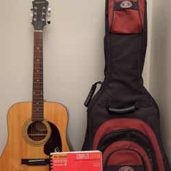 Title:
Epiphone Acoustic Guitar + Padded Case + Guitar Method Book – Great Condition