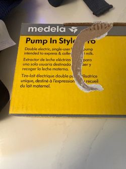 Medela breast pump (never used)