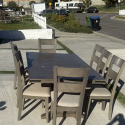 Gray Dining Room Table With 8 Chairs And 2 Table Extensions 