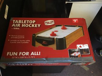 Tabletop air hockey