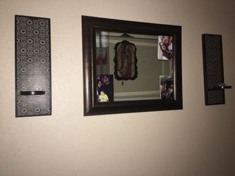 mirror wit two candle holders
