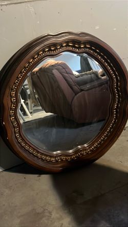 Round ornate mirror