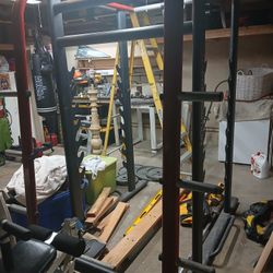 Weight Lifting Squat Rack With Olympic Weights And Curl Bar 