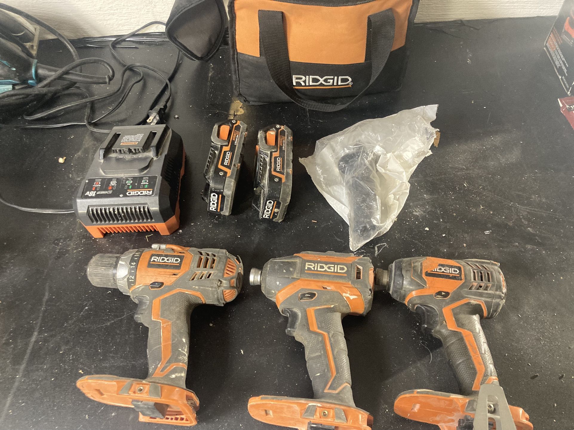 ridgid impact gun with battery and drill