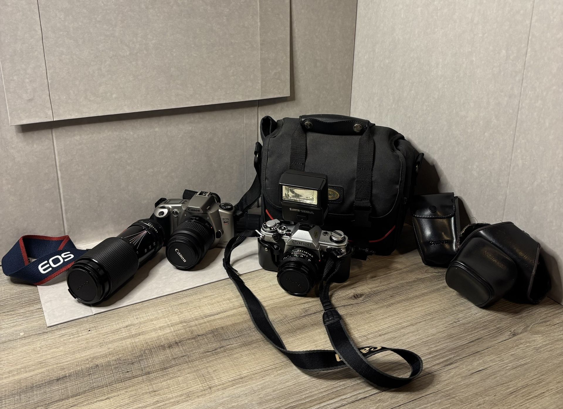 2 Cameras Canon AE-1 35mm and Canon EOS Rebel XSn 35mm w/ case, light, and strap