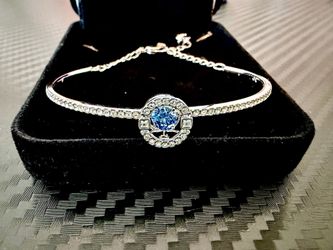 Swarovski Sparkling Dance Crystal Bangle Bracelet with floating blue crystal