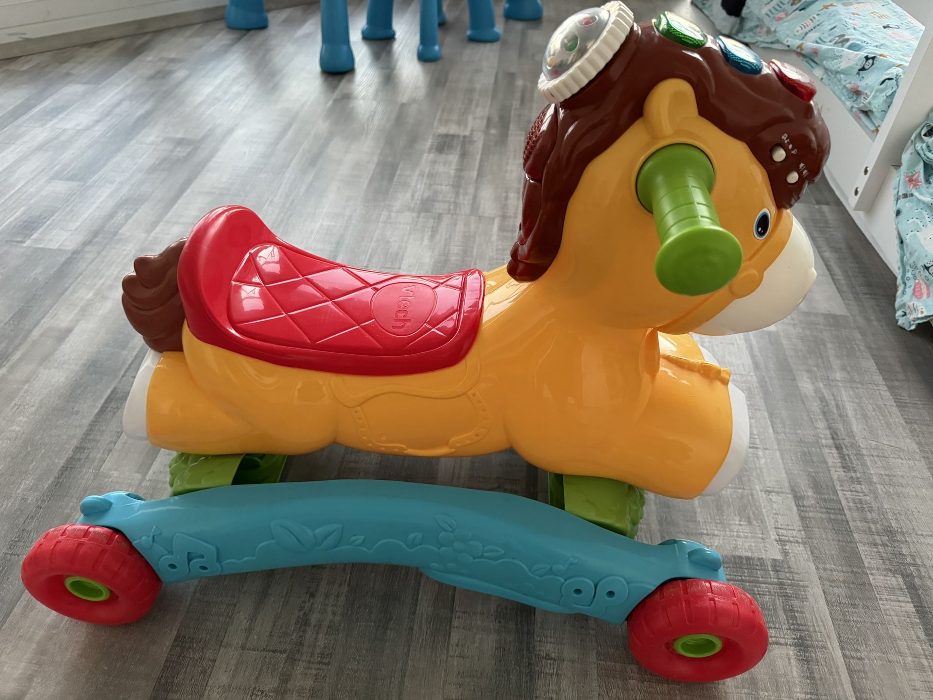 VTech Gallop and Rock Learning Pony Electronic Motion-Activated Play Ride-on