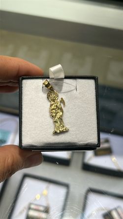 10k gold reeper pendant