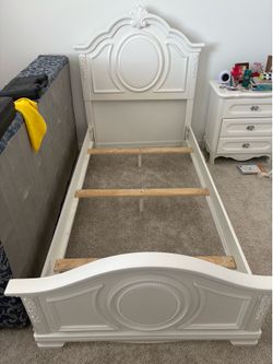 White Twin headboard set.