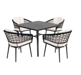 Brand new in box patio  4 chairs