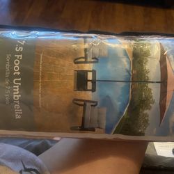 A Pair Of 7 1/2 Foot Umbrellas Brand New
