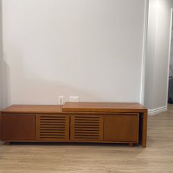 63 Inch Extendable TV Stand for TVs up to 75", Entertainment Cabinet with Storage & Adjustable Panel