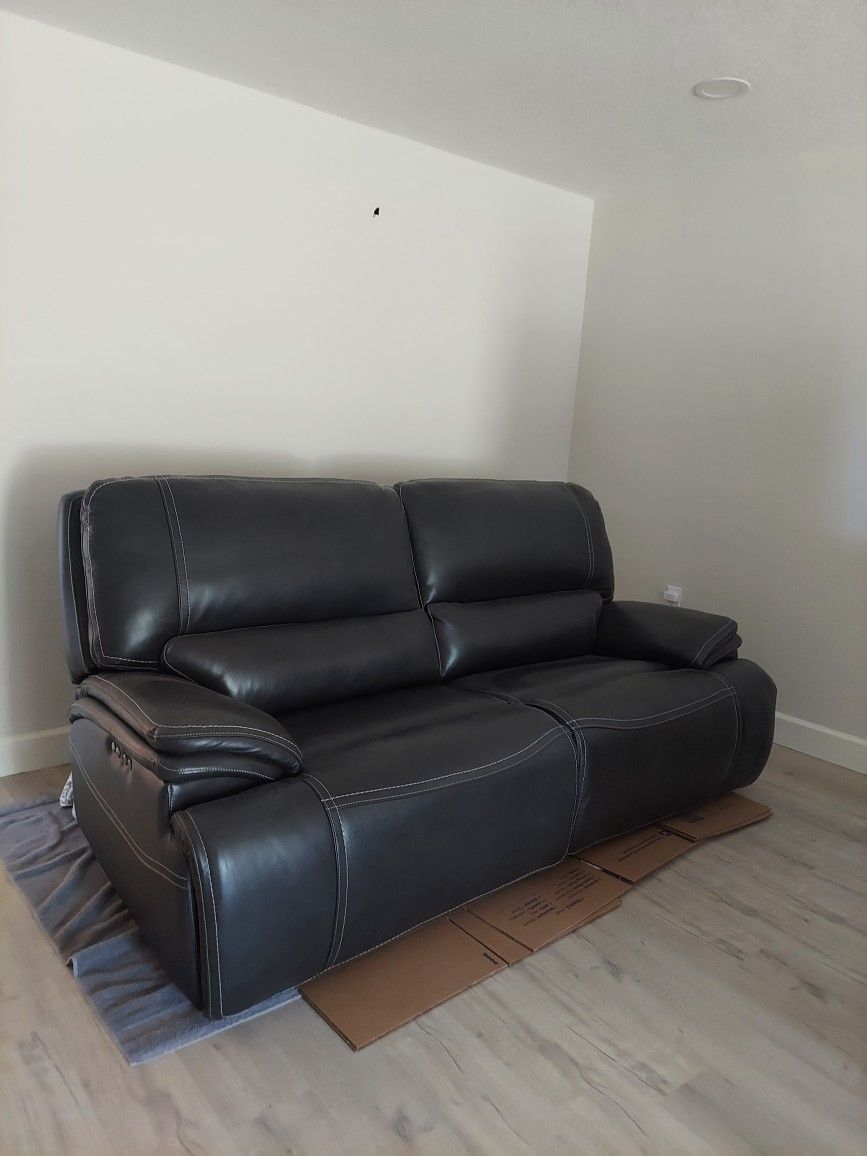 Pristine Leather Reclining Sofa From Baer's
