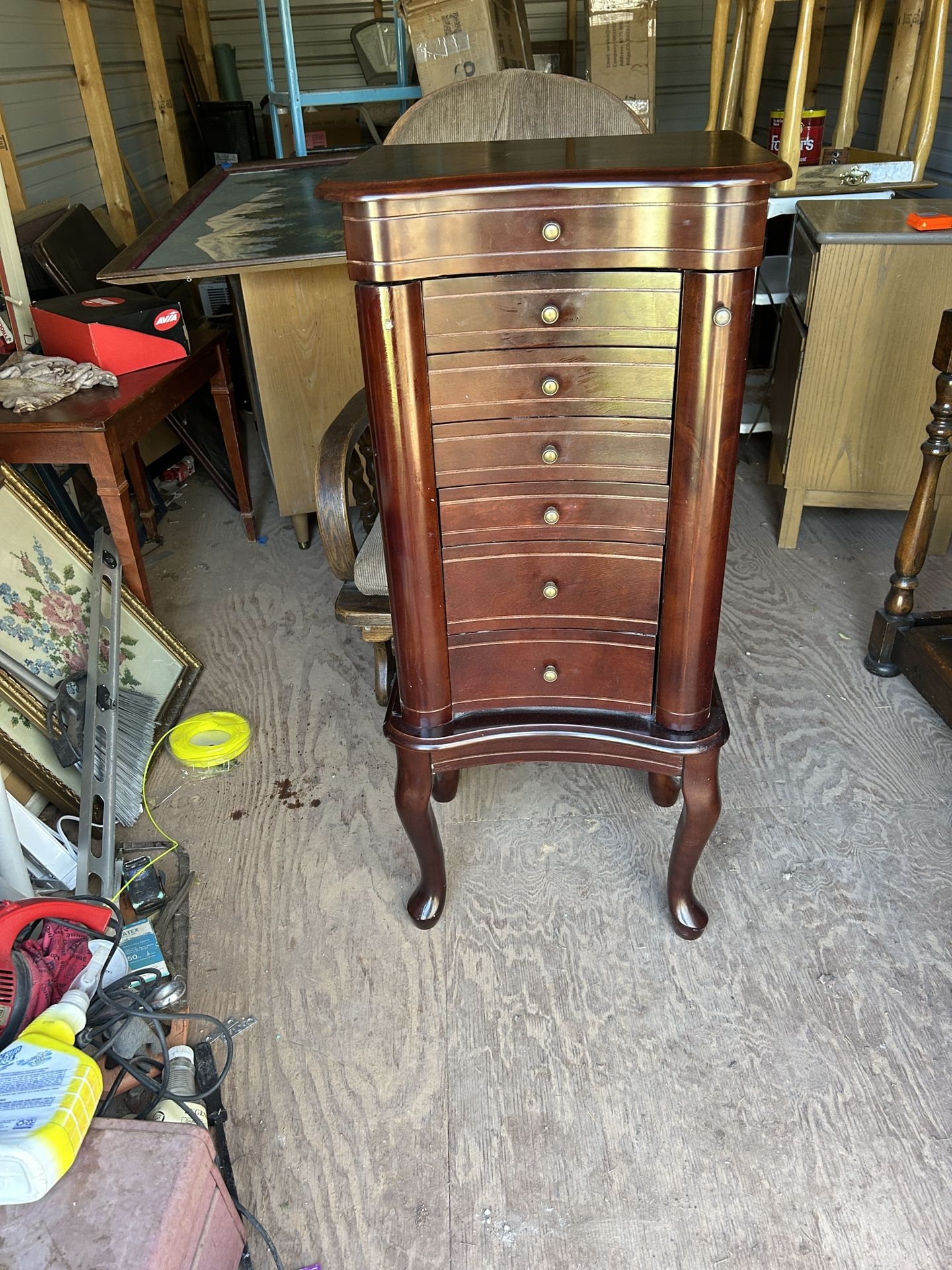 a nice jewelry cabinet its 40 inches tall 18 inches tall and 14 inches wide