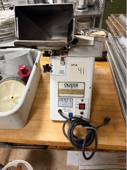 Oliver 702-NSF Countertop Automatic Bun & Bagel Slicer 115V 1/3HP 1PH
