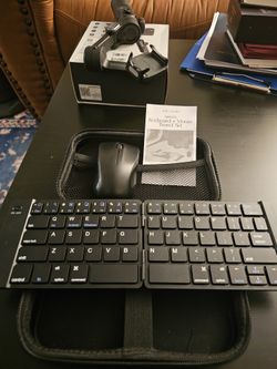 BRAND NEW WIRELESS KEYBOARD AND MIOUSE. COMES WITH A CASE AND TRAVEL READY AND VERY COMPACT