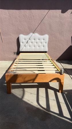 Twin size bed with headboard