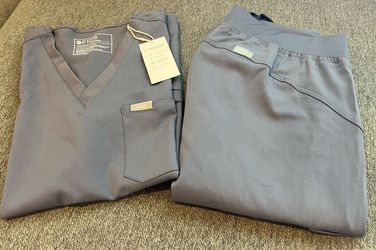 NWT Women’s Figs Scrub Set - Greyish Blue top with multiple pockets and straight bottom (small)