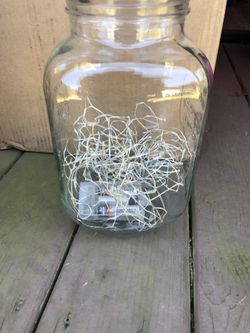 We have 18 new glass jars with lights. Great for wedding centerpieces. Paid $35 each with lights. Asking $20 per jar