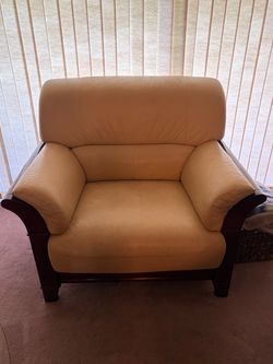 White leather chair, wood base