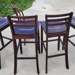4 Wooden Barstools 43" Tall, Total.   1 Small Wicker Chair 