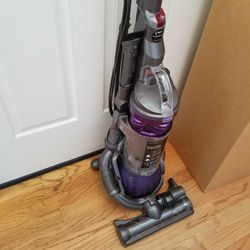 NEW cond DYSON DC25 ANIMAL  , BALL  VACUUM  , WITH ATTACHMENTS  , AMAZING POWER SUCTION  , WORKS EXCELLENT  , IN THE BOX 