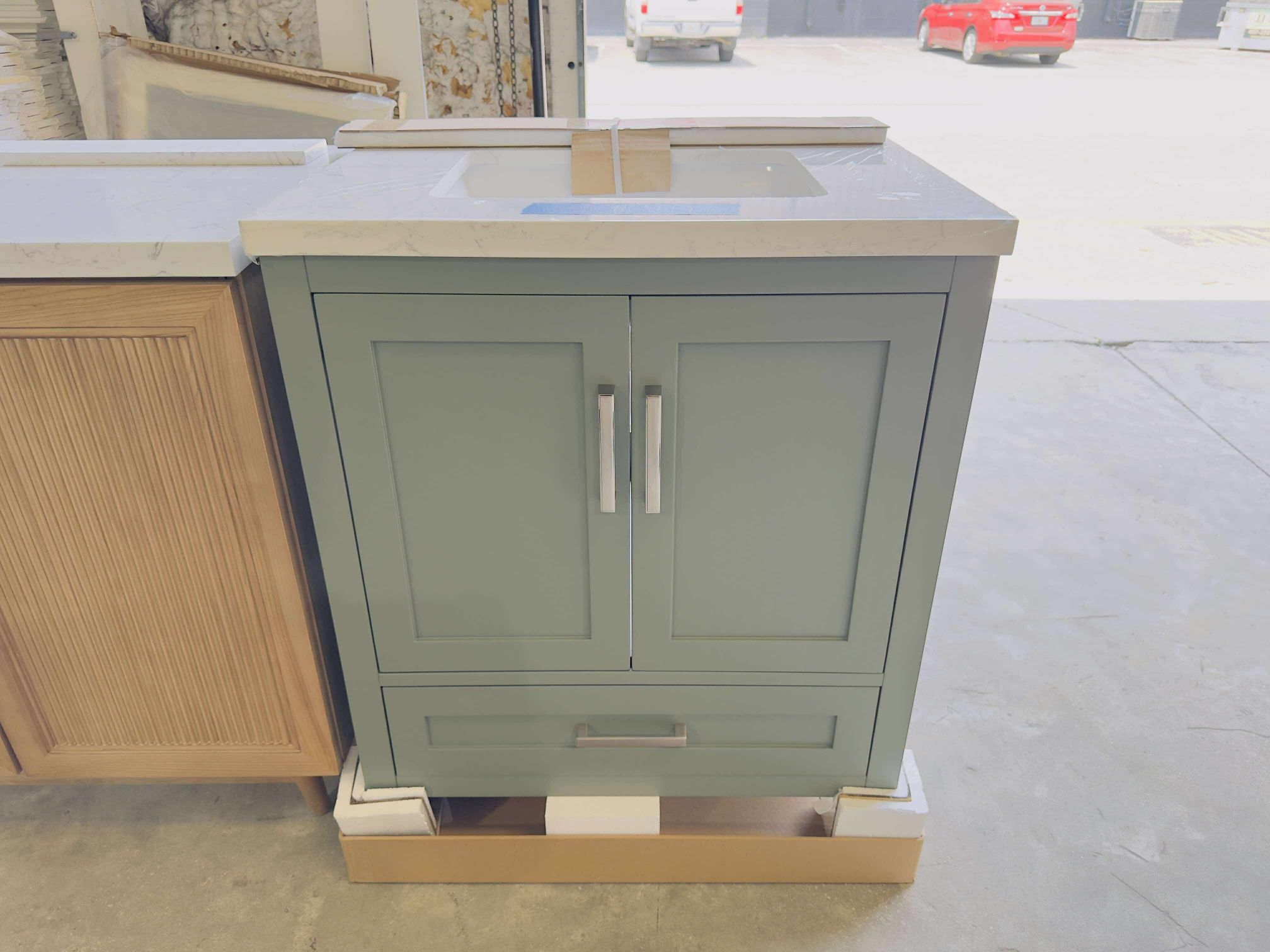 30 in Single Sink Bath Vanity in Sage Green with Marble Top in White  $475 