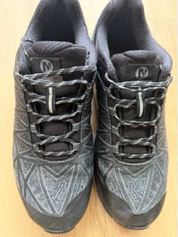 Merrell Agility Synthesis 2 trail running shoes feature a sleek black jacquard and TPU upper with specialized, stabilizing flex-grooves