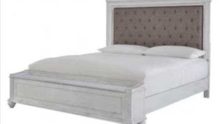 Kanwyn Upholstered Storage Queen Sized Bed by Ashley's Furniture.