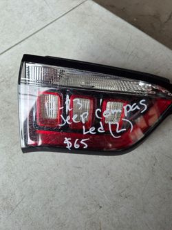Jeep compass left tail light tailgate oem