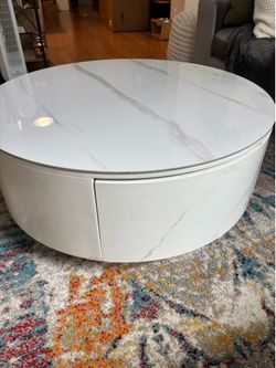 Round Marble coffee table with hidden drawers!