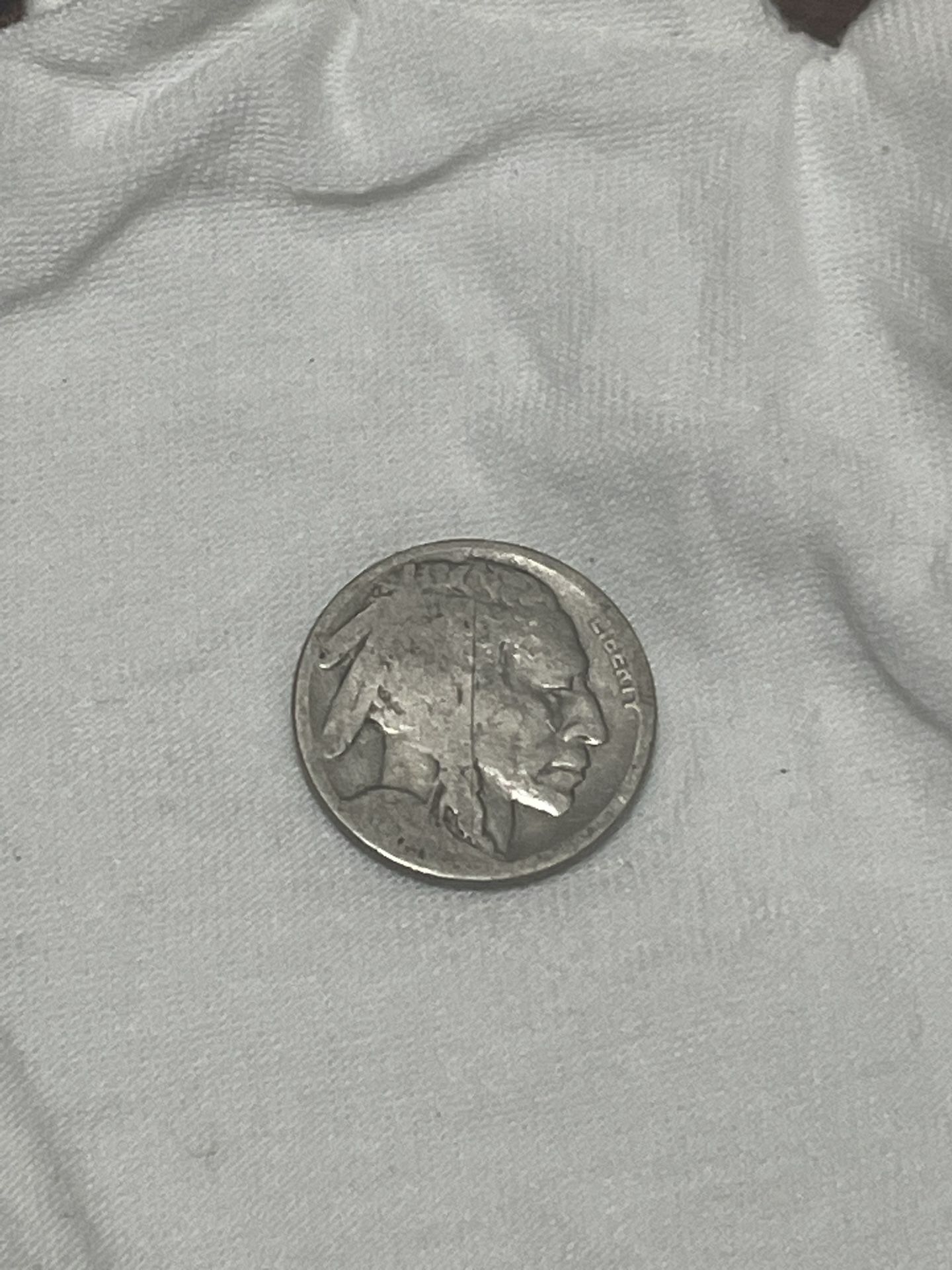 Buffalo nickel date worn off