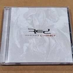 Red "Innocence & Instinct" CD