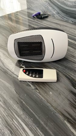One small cyber heater brand-name with remote control works excellent like new