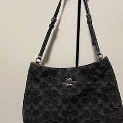 Black denim Coach bag