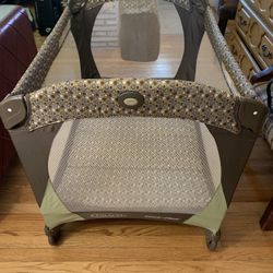 Pack And Play Playpen . Excellent condition. Has an attachment that holds the diapers          $45