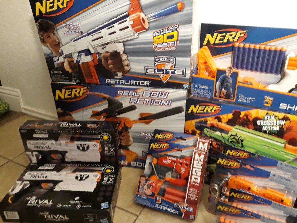 Huge Nerf Bundle all brand new! With 11 Guns/Bows and 10 packs of accessories and darts!