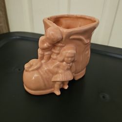 Old Lady In The Shoe Pottery 