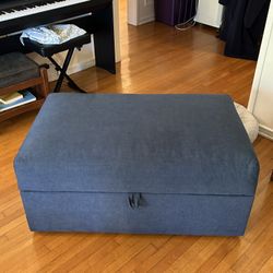 Blue Pottery Barn Big Sur Ottoman With Pullout Table.