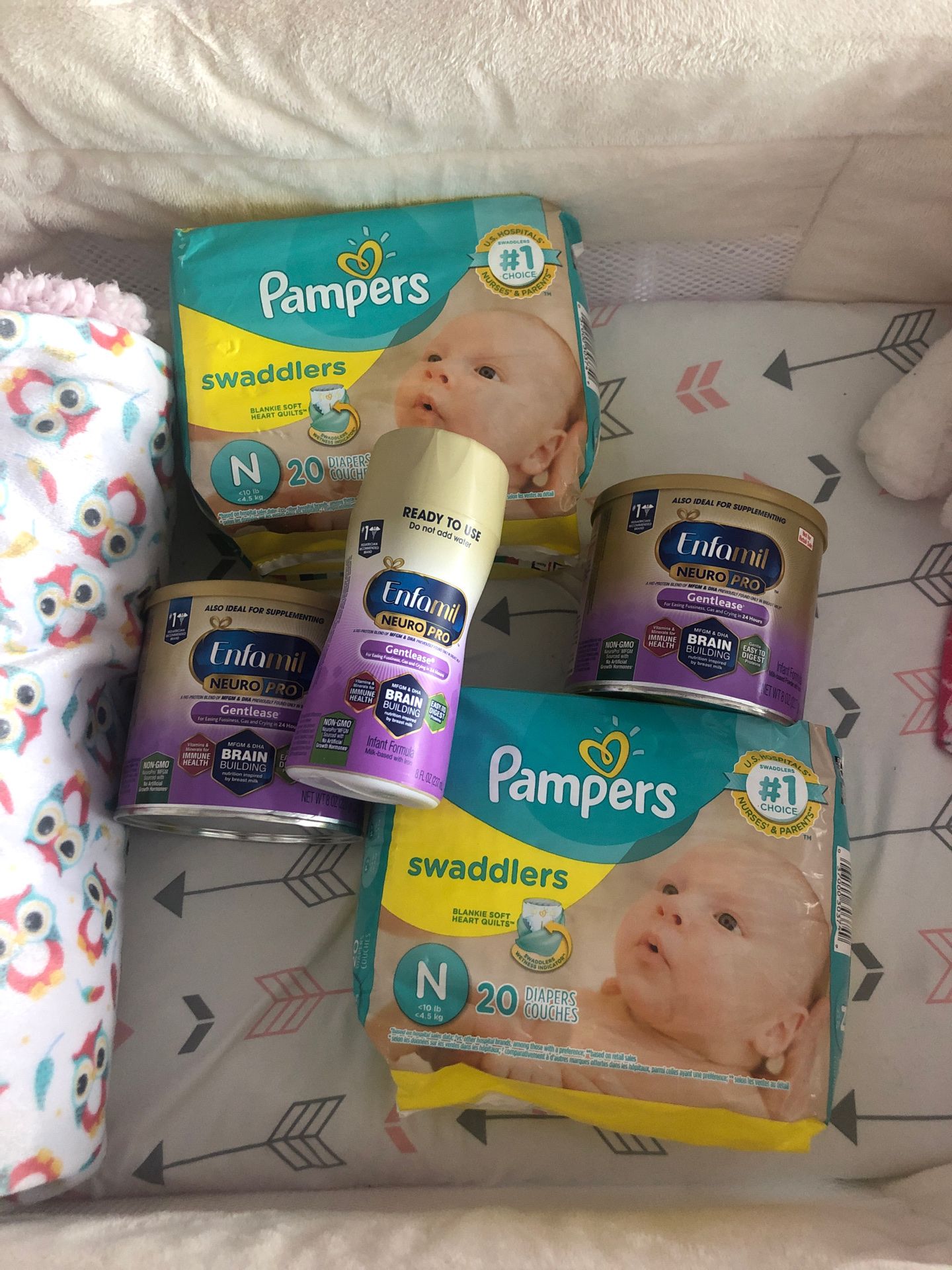 2 cans Enfamil one ready to use and two packs NB diapers