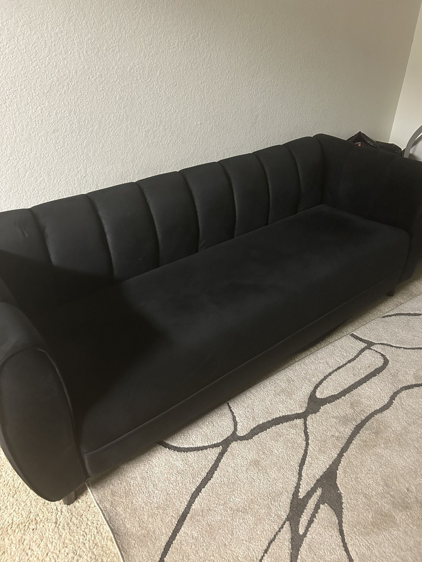 2 Black Sofas