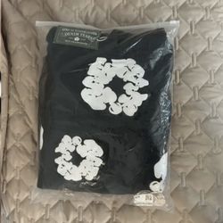 Black And White Denim tear size medium