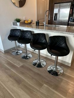 Four Matching Swivel Barstools