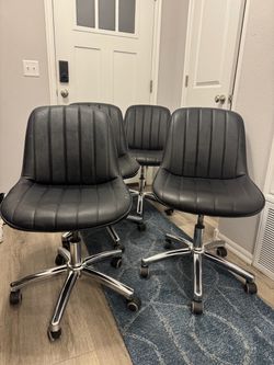 Set of 4 Black Faux Leather Office Chairs
