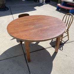 Antique oak children’s round table and 2 chairs