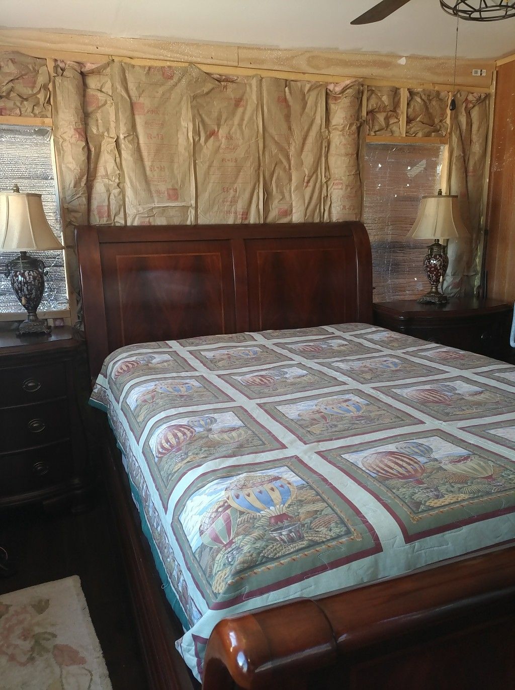 Queen sleigh bed set, two nightstands, and dresser